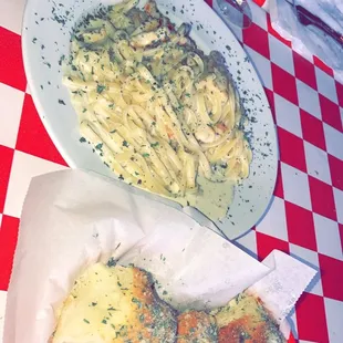 Fettuccine Alfredo with chicken and garlic bread