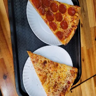 A slice of cheese and a slice of pepperoni.