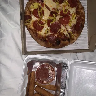 Small pizza &amp; cheese sticks