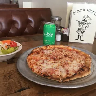 Pizza and fresh salad