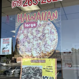 a sign in the window of a restaurant