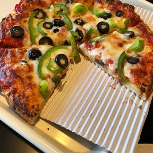 Cheese pizza topped with olives and bell peppers!
