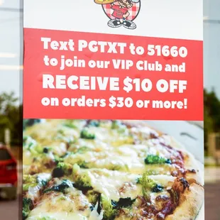 a sign for a pizza restaurant