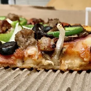 Thick crust was paper thin in the middle. Almost non-existent.