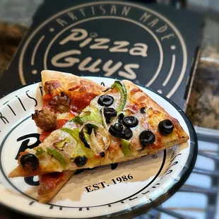 Had a half and half - meat and veggie pizza. Very good. And split the Garden Salad. Well worth it.