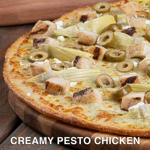 a creamy pesto chicken pizza