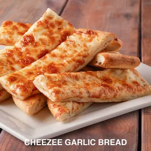 a plate of cheesy garlic bread