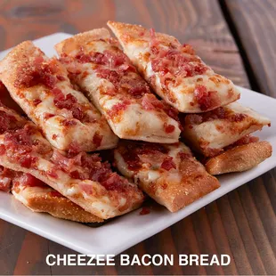 a plate of cheesy bacon bread