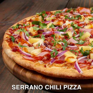a pizza on a wooden board