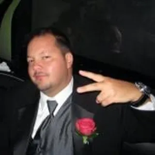 Dan E.