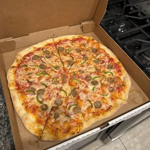 Sausage onion pepper pizza