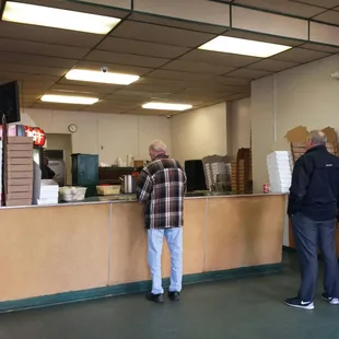Order counter.  They are very efficient despite being busy.