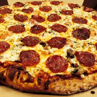 a pepperoni pizza in a box