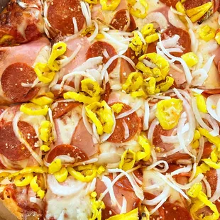 Large pepperoni, onion, ham and peppers