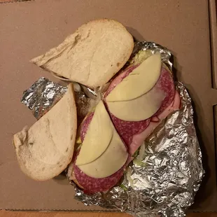 Uncooked ham and cheese sub
