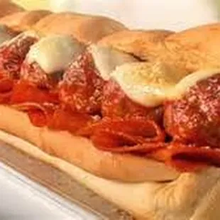 a meatball sub sandwich on a bun