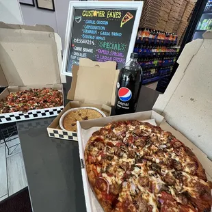 a pizza in a box and a pizza in a box