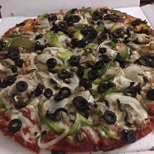 Pizza house special with sausage, mushrooms, onions , bell pepper, I added black olives