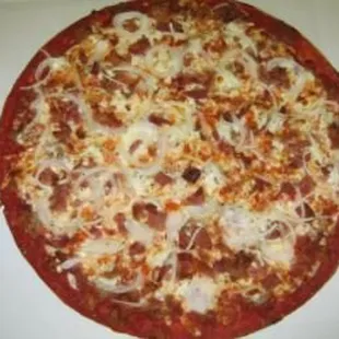 a pizza with cheese and meat