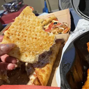 The back of stuffed crust pizza