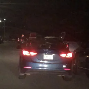 stopped in the middle of the street for 5 minutes blocking traffic instead of finding parking or pulling into a driveway. so ignorant.