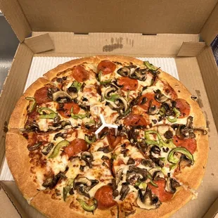 a pizza in a pizza box