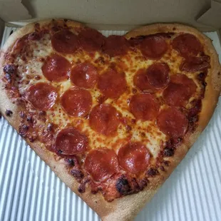 Pizza Hut. Heart shaped pizza on Valentine's day. Ordered two of these. This is one of them. My son had one for himself.