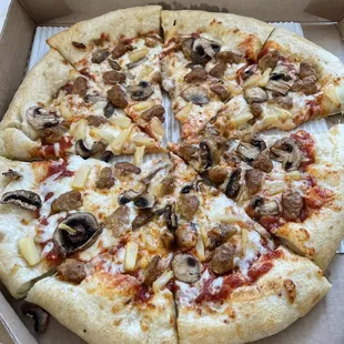 a pizza in a pizza box