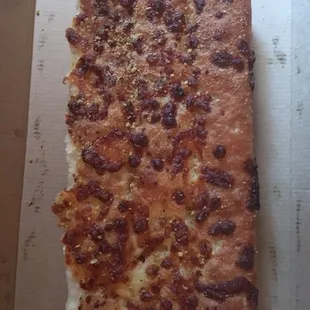 Is there cheese on here ? We will never know it's so burnt