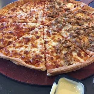 Medium thin crust, half cheese, half sausage.