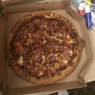 a pizza in a pizza box