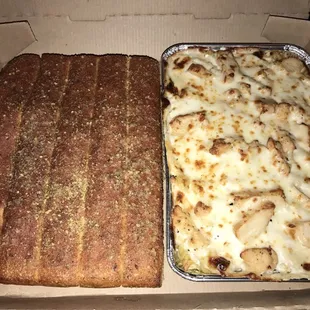 Chicken Alfredo Pasta and breadsticks