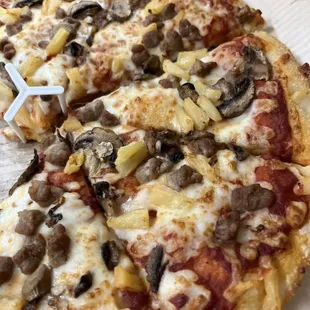 Sausage toppings with mushrooms and pineapple