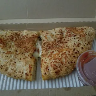 Pzone: $6.89 with service fee and tax I should have just went to subway and get a wrap