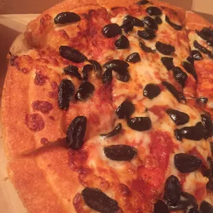 Only middle portion has cheese and  sauce.