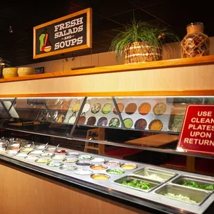 a buffet with a variety of food items