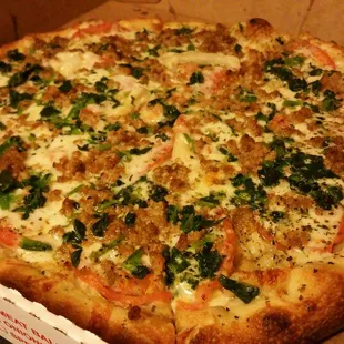 First time. White pizza w/ spinach, tomatoes and sausage. Smells heavenly. OG Bloomfield Pizza joint!