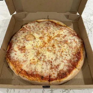 a cheese pizza in a box