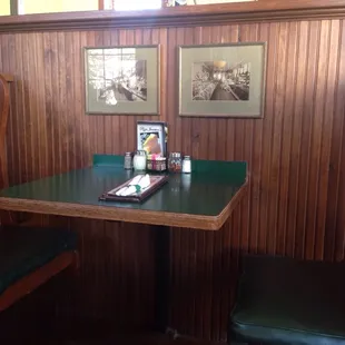 Cool booths made from the old train station benches.