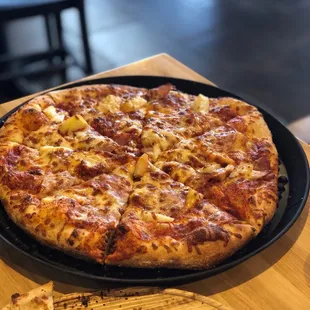 Hawaiian Pizza with fresh cut Pineapple. Crust is so good.