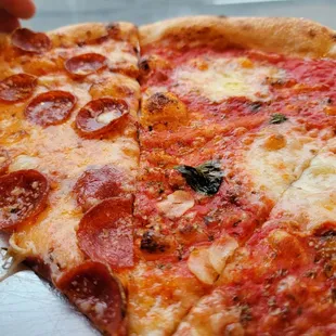 a slice of pepperoni pizza