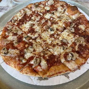 Pepperoni mushroom XL pizza. Look closely it&apos;s more sauce than toppings