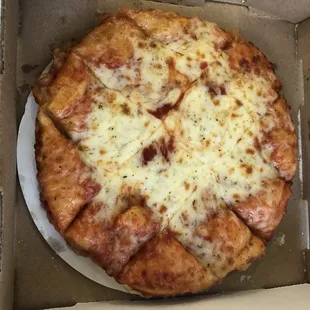 This is the small pizza with extra cheese. ‍