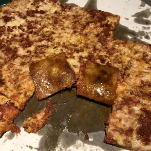 Pepperoni and cheese pizza with copious amounts of grease. Gross.