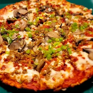 I have plenty of help eating this pizza.