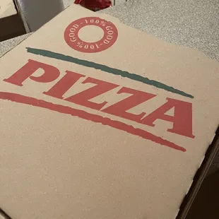a pizza box on a table