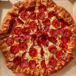 a pepperoni pizza in a box
