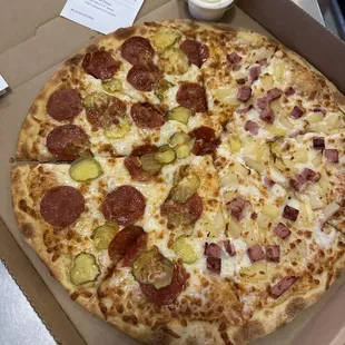 Half Hawaiian Pizza, Half pepperoni and pickles.