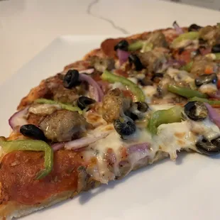Supreme pizza leftovers. Too good to take a picture when we first received our pizza. Lol