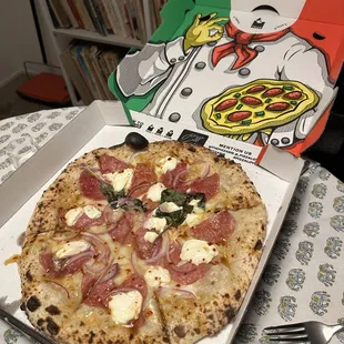 Pizza in a colorful novelty box